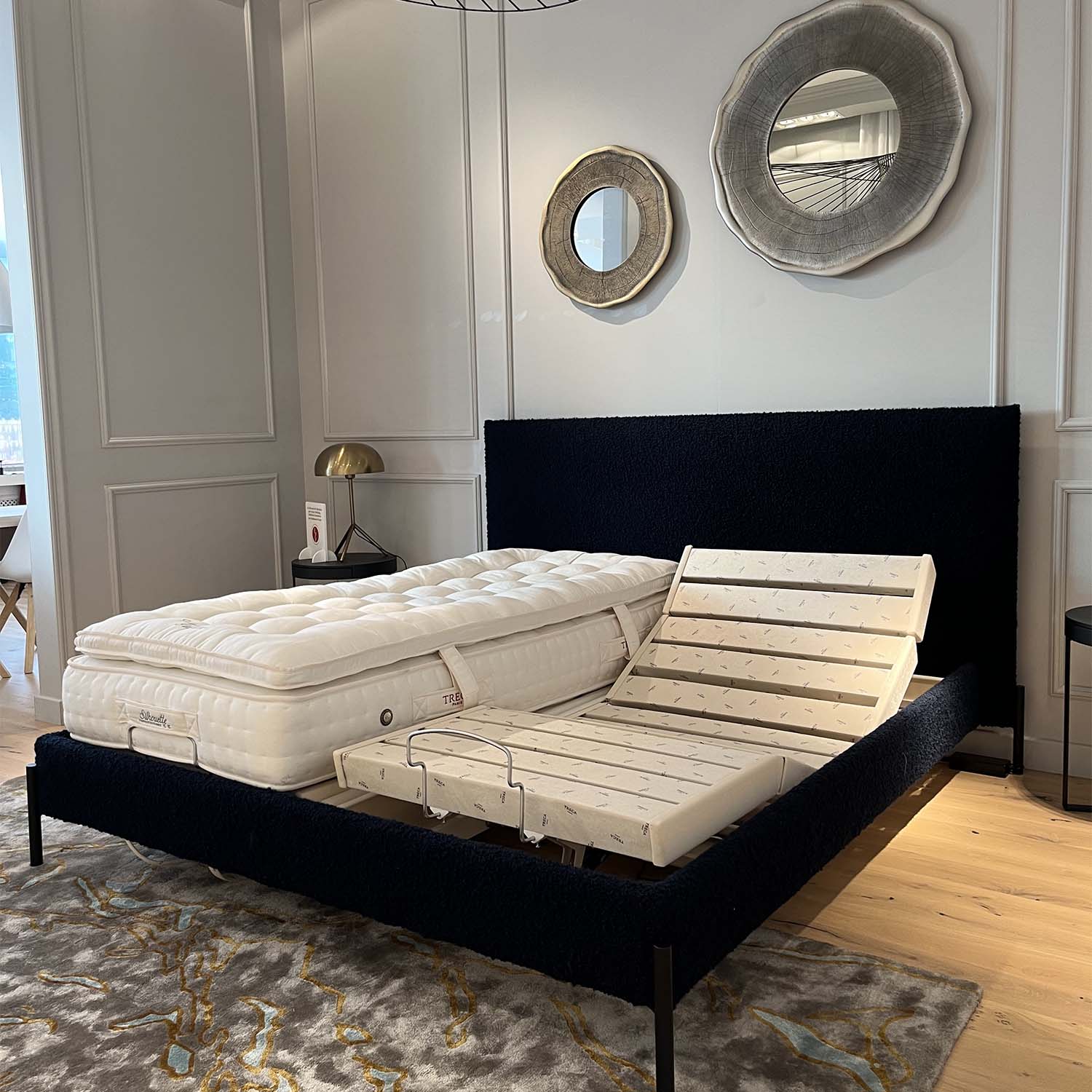 Bed with trecaflex m5 bed base and mattress in a bedroom setting