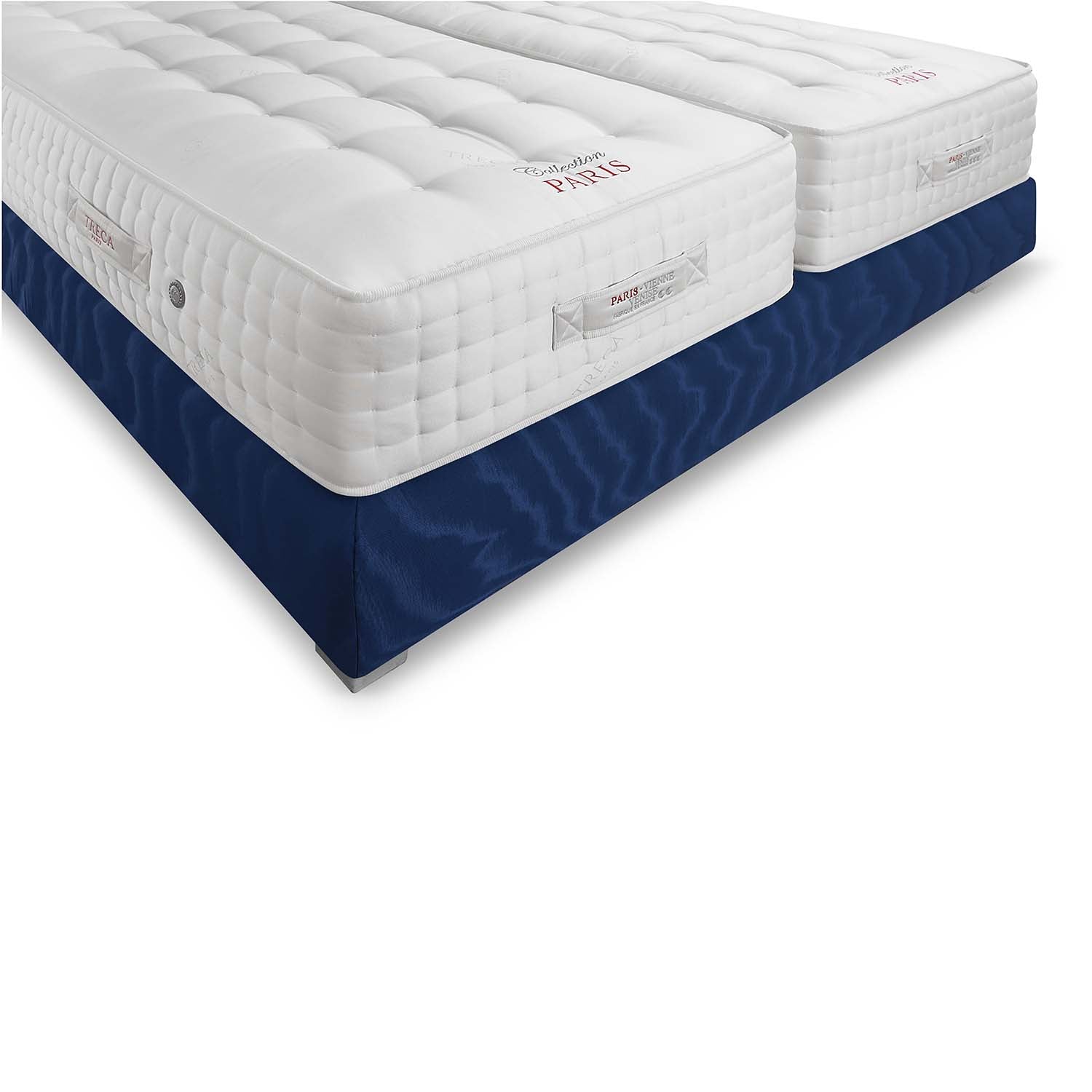 angled shot of two Treca Paris Vienne Venise mattresses on a white background