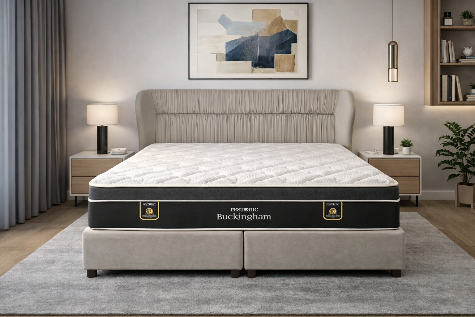 Bed with a Restonic Buckingham mattress in a bedroom setting