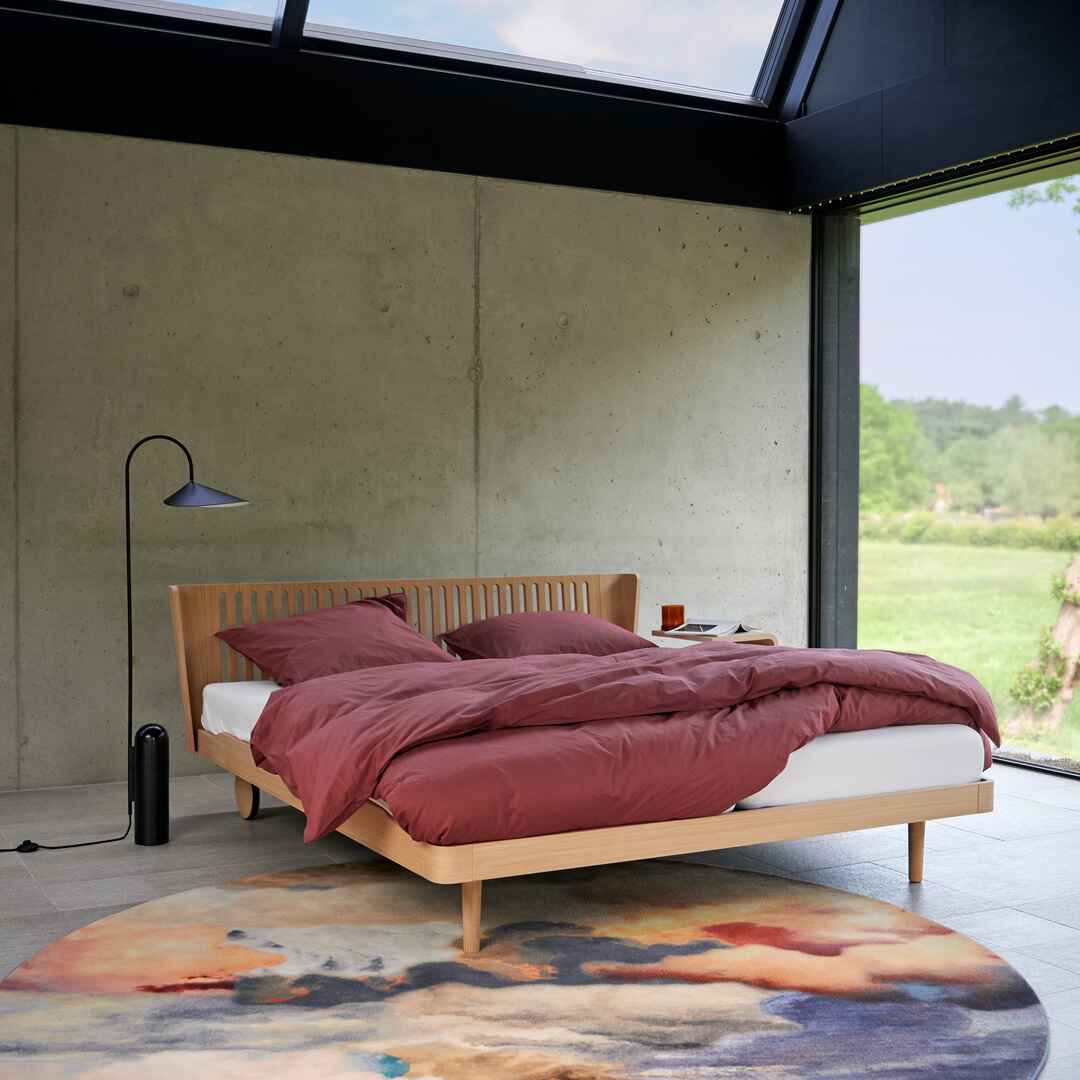 Noa with Back Wheels and Milled Headboard in Balanced Oak