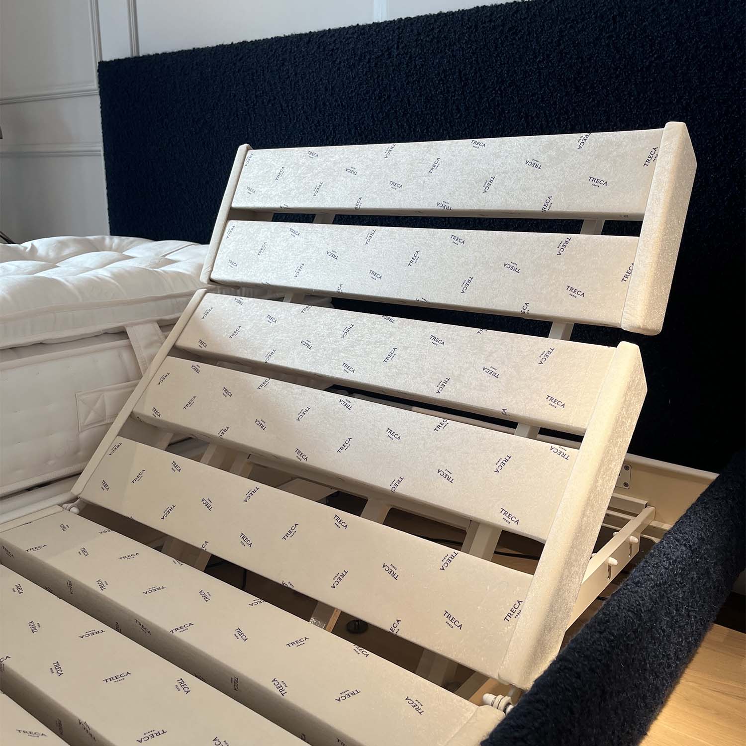 trecaflex m5 bed base on a bed in a room
